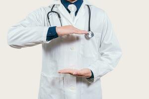 Doctor hands presenting something empty handed. Doctor holding something in his hands isolated, Unrecognizable doctor holding empty hands isolated photo