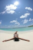 beautiful young woman  on beach have fun and relax photo