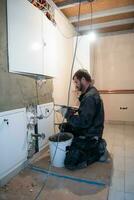 Worker plastering the wall by concrete photo