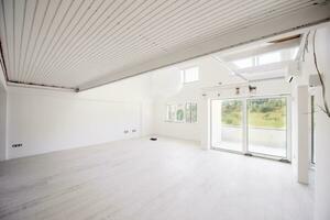 Interior of empty stylish modern open space two level apartment photo