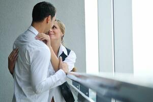 romantic happpy couple on balcony photo