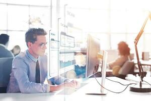 businessman working using a computer in startup office photo