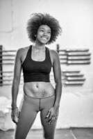 black woman after a workout at the gym photo