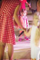 little girl dancing in the kids disco photo