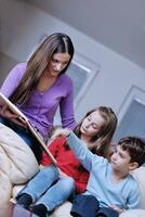 happy young family have fun at home photo
