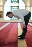 muslim prayer inside the mosque photo