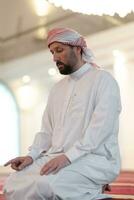 muslim prayer inside the mosque photo