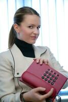 Businesswoman with telephone photo