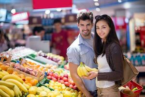 couple shopping in a supermarket photo