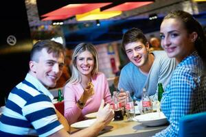 friends have lanch break in shopping mall photo