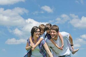 happy young family have fun outdoors photo