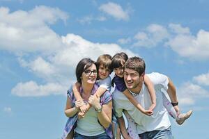 happy young family have fun outdoors photo