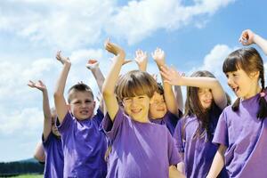 happy kids group  have fun in nature photo