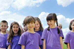 happy kids group  have fun in nature photo