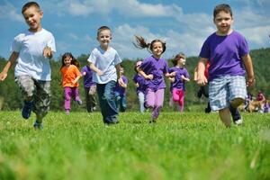 happy kids group  have fun in nature photo