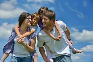 happy young family have fun outdoors photo