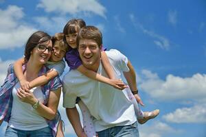 happy young family have fun outdoors photo