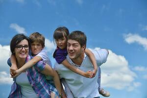 happy young family have fun outdoors photo