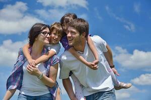 happy young family have fun outdoors photo