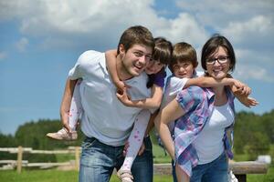 happy young family have fun outdoors photo