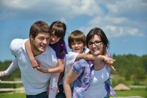 happy young family have fun outdoors photo