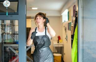 portrait of professional pet hairdresser woman photo