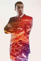 Double exposure of businessman and city photo
