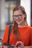 student girl with tablet computer photo