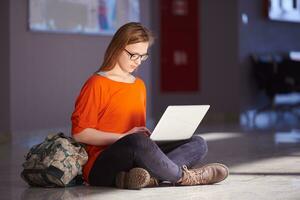 student girl with laptop computer photo