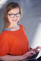 student girl with laptop computer photo