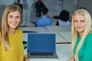 student girls together in classroom photo