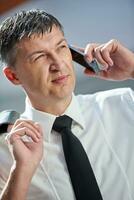 business man using phone photo