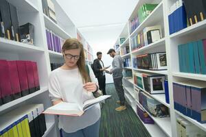 students group  in school  library photo