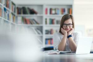 female student study in school library photo