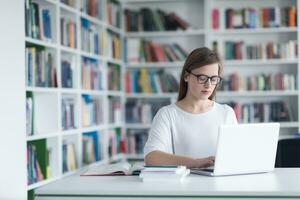 female student study in school library photo