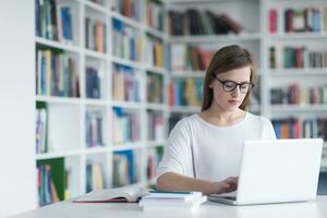 female student study in school library photo