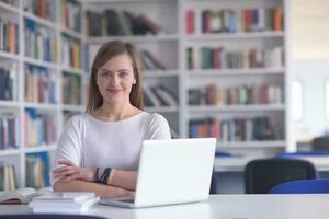 female student study in school library photo