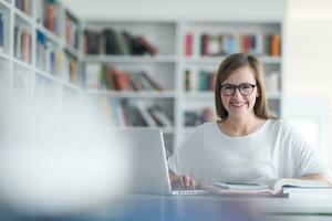 female student study in school library photo