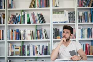 student study  in school library photo