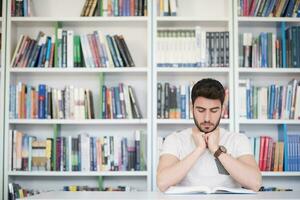 student study  in school library photo