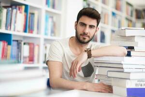 student study  in school library photo