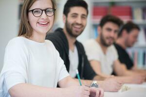 group of students study together in classroom photo