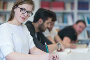 group of students study together in classroom photo