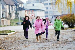 school girls running away photo