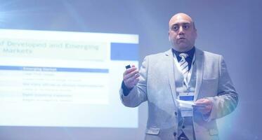 businessman giving presentations at conference room photo