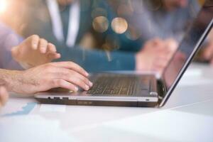 business people hands using laptop computer photo