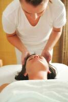 beautiful woman have massage at spa and wellness center photo
