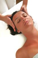 beautiful woman have massage at spa and wellness center photo