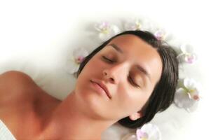 beautiful woman have massage at spa and wellness center photo