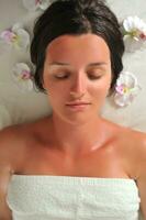 beautiful woman have massage at spa and wellness center photo